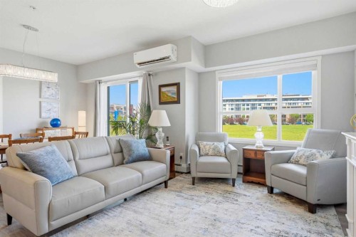 212-4150 Seton Drive Sw, Calgary, AB - Indoor Photo Showing Living Room