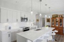 212-4150 Seton Drive Sw, Calgary, AB  - Indoor Photo Showing Kitchen With Double Sink With Upgraded Kitchen 