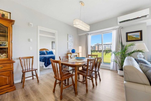 212-4150 Seton Drive Sw, Calgary, AB - Indoor Photo Showing Dining Room