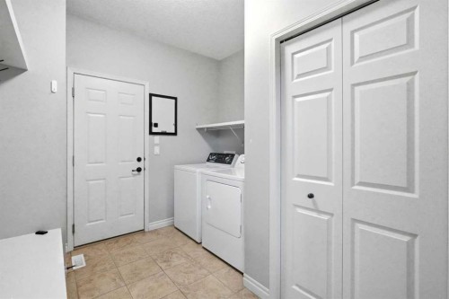 18 Panatella Terrace Nw, Calgary, AB - Indoor Photo Showing Laundry Room