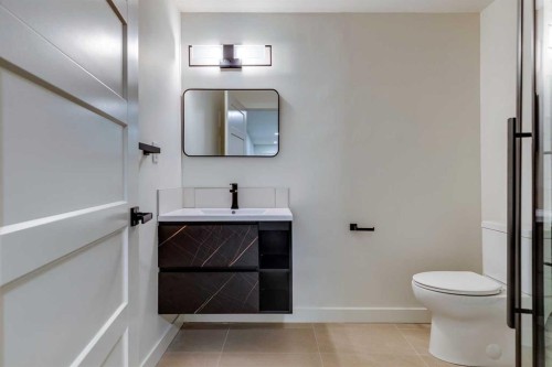 16 Simcrest Point Sw, Calgary, AB - Indoor Photo Showing Bathroom