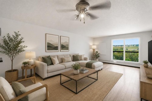 710-8604 48 Avenue Nw, Calgary, AB - Indoor Photo Showing Living Room