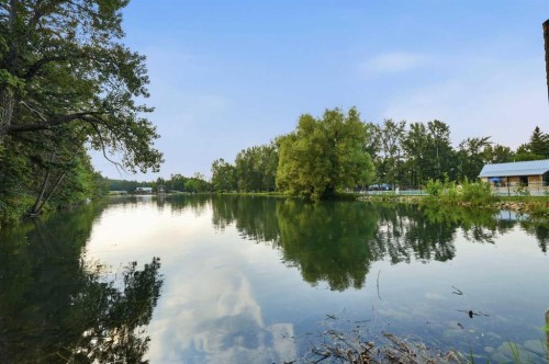 710-8604 48 Avenue Nw, Calgary, AB - Outdoor With Body Of Water With View