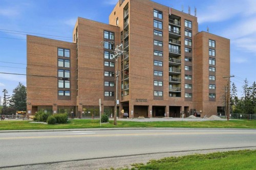 710-8604 48 Avenue Nw, Calgary, AB - Outdoor With Facade