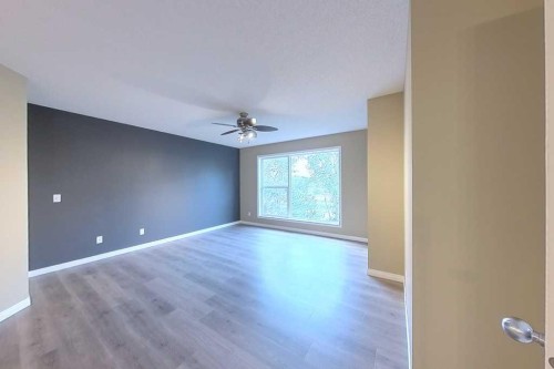 149 Rockborough Green Nw, Calgary, AB - Indoor Photo Showing Other Room