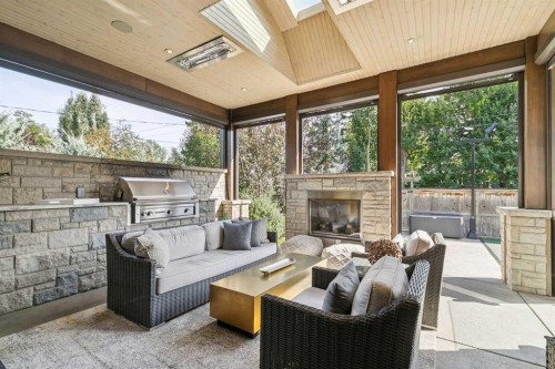 1623 49 Avenue Sw, Calgary, AB - Outdoor With Fireplace With Deck Patio Veranda With Exterior