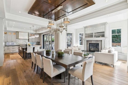 1623 49 Avenue Sw, Calgary, AB - Indoor Photo Showing Dining Room With Fireplace