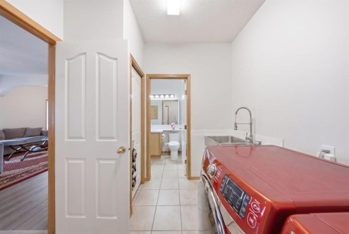 125 Tarawood Place Ne, Calgary, AB - Indoor Photo Showing Laundry Room