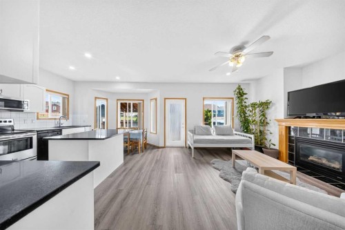 125 Tarawood Place Ne, Calgary, AB - Indoor With Fireplace