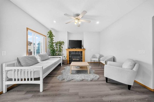 125 Tarawood Place Ne, Calgary, AB - Indoor Photo Showing Living Room With Fireplace