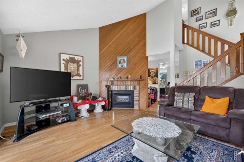 36 Templegreen Bay Ne, Calgary, AB - Indoor Photo Showing Living Room With Fireplace