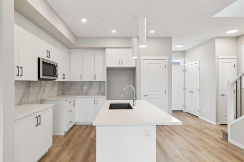 413 Hotchkiss Drive Se, Calgary, AB - Indoor Photo Showing Kitchen With Upgraded Kitchen