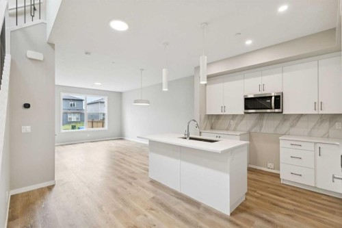 413 Hotchkiss Drive Se, Calgary, AB - Indoor Photo Showing Kitchen With Upgraded Kitchen