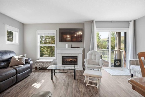 3 Chaparral Valley Gardens Se, Calgary, AB - Indoor Photo Showing Living Room With Fireplace
