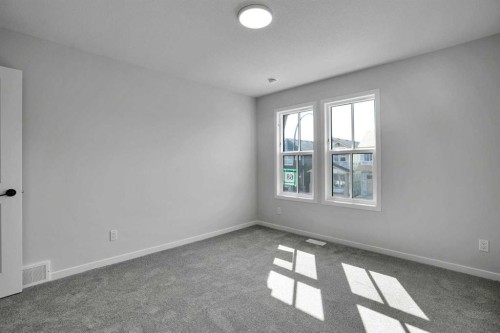 68 Sugarsnap Green Se, Calgary, AB - Indoor Photo Showing Other Room