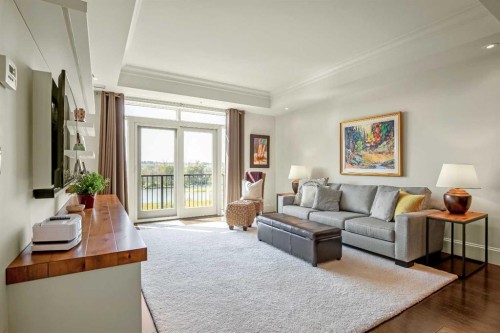 401-131 Quarry Way Se, Calgary, AB - Indoor Photo Showing Living Room