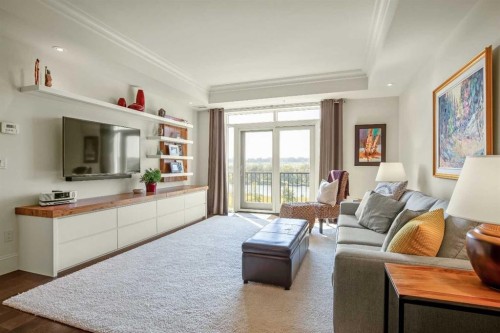 401-131 Quarry Way Se, Calgary, AB - Indoor Photo Showing Living Room