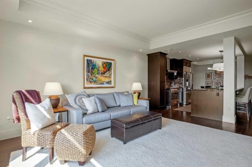 401-131 Quarry Way Se, Calgary, AB - Indoor Photo Showing Living Room