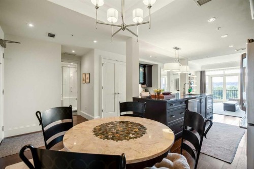 401-131 Quarry Way Se, Calgary, AB - Indoor Photo Showing Dining Room