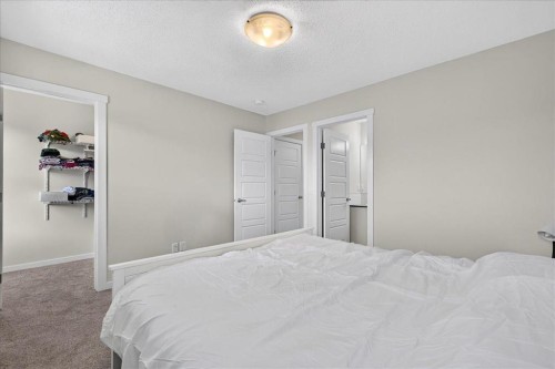 246 Cranbrook Square Se, Calgary, AB - Indoor Photo Showing Bedroom