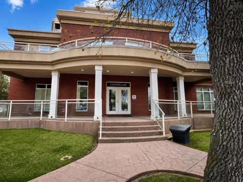 7305-14 Hemlock Crescent Sw, Calgary, AB - Outdoor With Balcony With Deck Patio Veranda