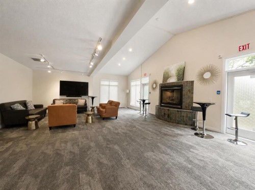 7305-14 Hemlock Crescent Sw, Calgary, AB - Indoor With Fireplace