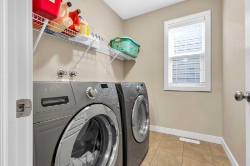 21 Evansfield Way Nw, Calgary, AB - Indoor Photo Showing Laundry Room