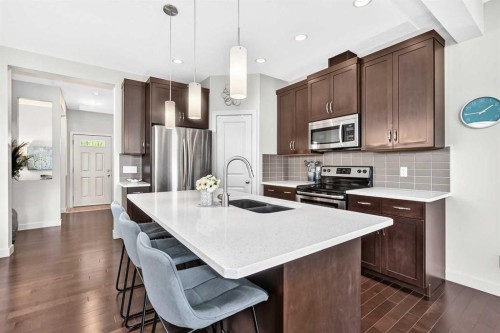 189 Chaparral Valley Drive Se, Calgary, AB - Indoor Photo Showing Kitchen With Double Sink With Upgraded Kitchen