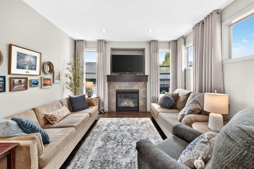 189 Chaparral Valley Drive Se, Calgary, AB - Indoor Photo Showing Living Room With Fireplace