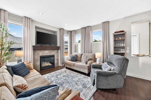 189 Chaparral Valley Drive Se, Calgary, AB - Indoor Photo Showing Living Room With Fireplace