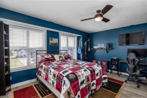 258 Copperleaf Way Se, Calgary, AB - Indoor Photo Showing Bedroom