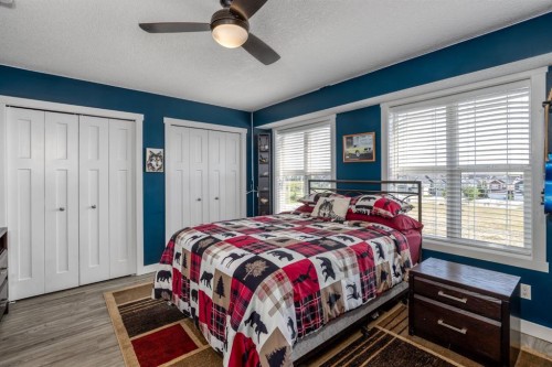 258 Copperleaf Way Se, Calgary, AB - Indoor Photo Showing Bedroom