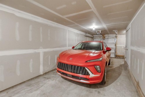 258 Copperleaf Way Se, Calgary, AB - Indoor Photo Showing Garage