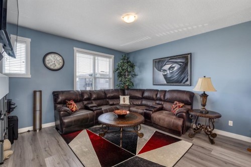 258 Copperleaf Way Se, Calgary, AB - Indoor Photo Showing Living Room