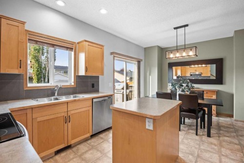 4446 Elgin Avenue Se, Calgary, AB - Indoor Photo Showing Kitchen With Double Sink
