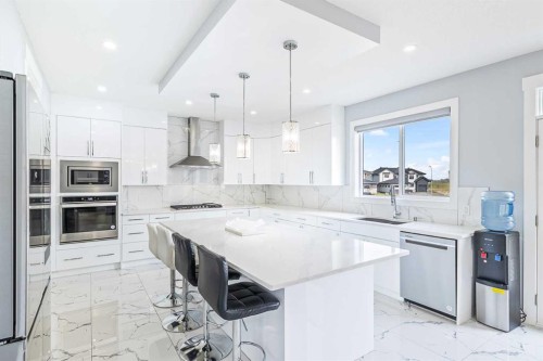 308 Grange Lane, Conrich, AB - Indoor Photo Showing Kitchen With Upgraded Kitchen