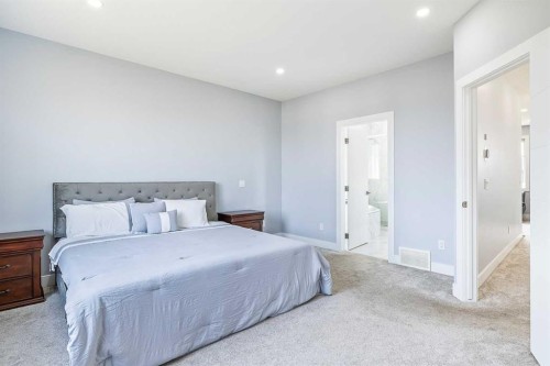308 Grange Lane, Conrich, AB - Indoor Photo Showing Bedroom