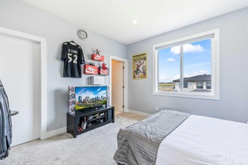 308 Grange Lane, Conrich, AB - Indoor Photo Showing Bedroom