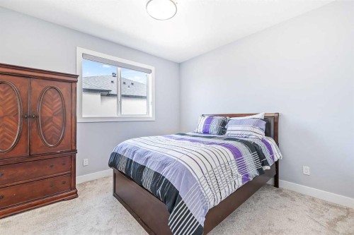 308 Grange Lane, Conrich, AB - Indoor Photo Showing Bedroom