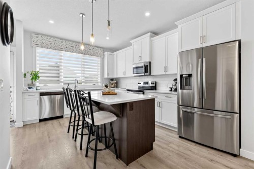 132 Creekside Drive Sw, Calgary, AB - Indoor Photo Showing Kitchen With Stainless Steel Kitchen With Upgraded Kitchen