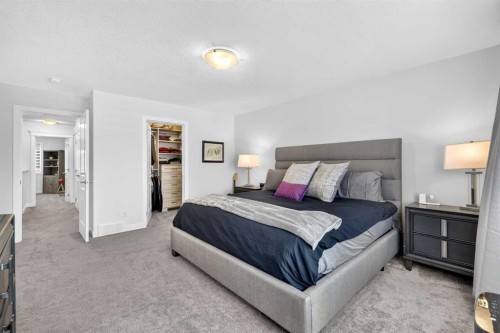 132 Creekside Drive Sw, Calgary, AB - Indoor Photo Showing Bedroom