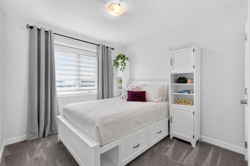 132 Creekside Drive Sw, Calgary, AB - Indoor Photo Showing Bedroom