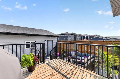 132 Creekside Drive Sw, Calgary, AB - Outdoor With Deck Patio Veranda With Exterior