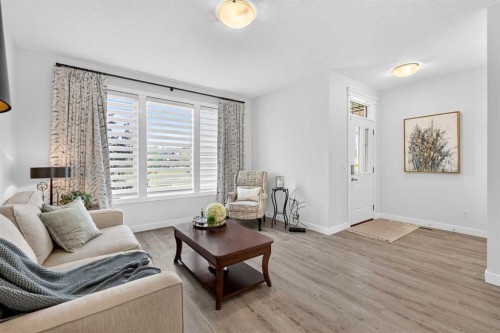 132 Creekside Drive Sw, Calgary, AB - Indoor Photo Showing Living Room