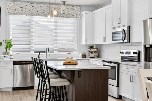 132 Creekside Drive Sw, Calgary, AB - Indoor Photo Showing Kitchen With Stainless Steel Kitchen With Upgraded Kitchen
