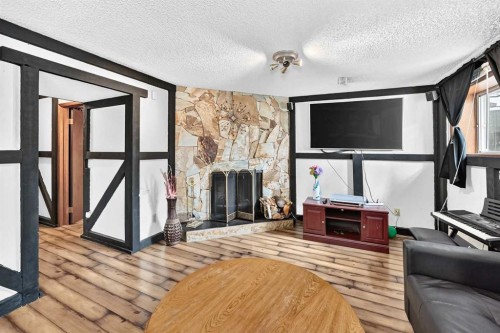 91 Castleridge Crescent Ne, Calgary, AB - Indoor With Fireplace