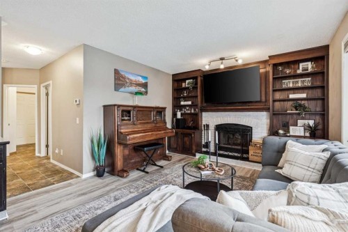 190 Mt Robson Close Se, Calgary, AB - Indoor Photo Showing Living Room With Fireplace