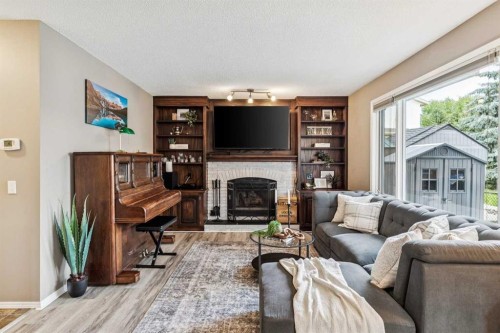 190 Mt Robson Close Se, Calgary, AB - Indoor Photo Showing Living Room With Fireplace
