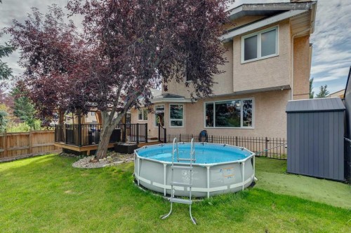 190 Mt Robson Close Se, Calgary, AB - Outdoor With Above Ground Pool With Backyard