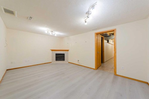 88 Country Hills Villas Nw, Calgary, AB - Indoor With Fireplace